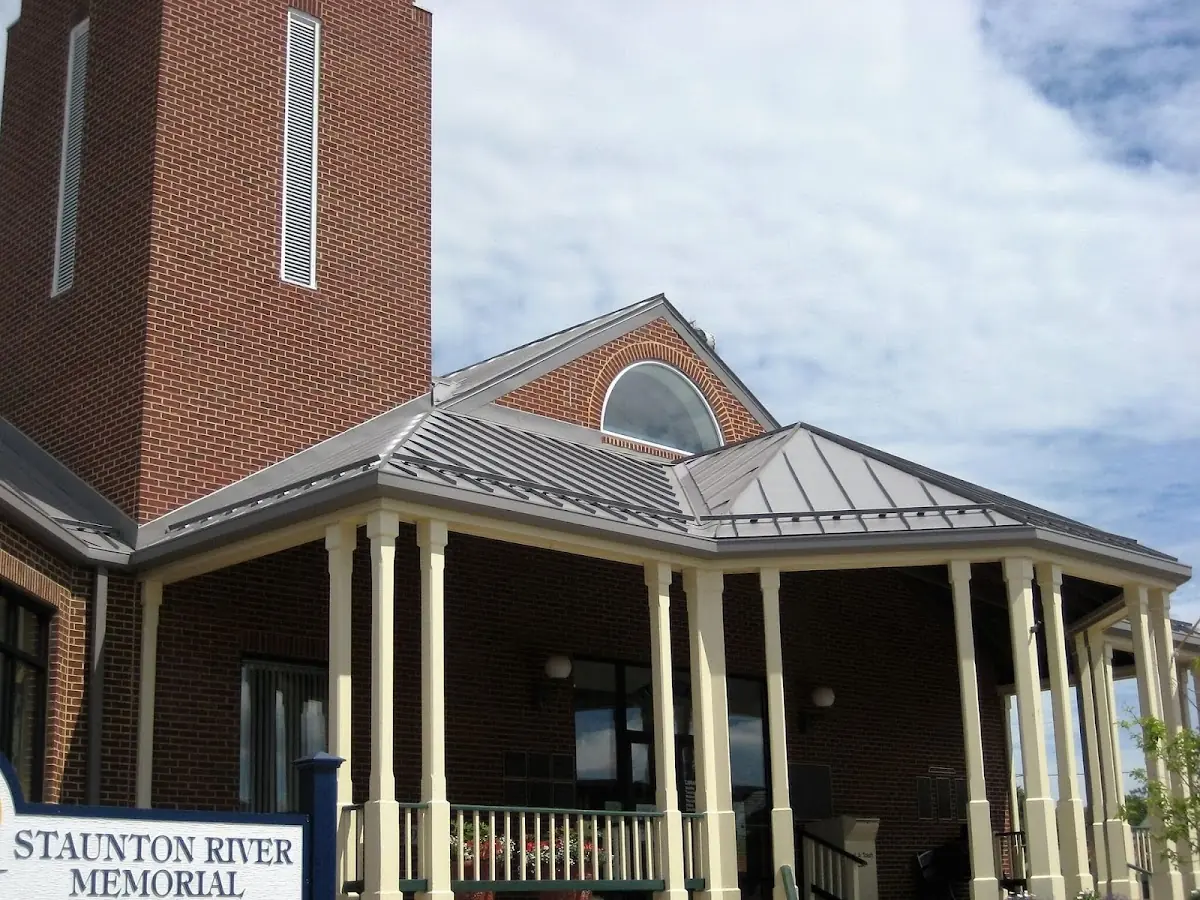 Skilled roofing craftsmen working on a residential roof in Berwick
